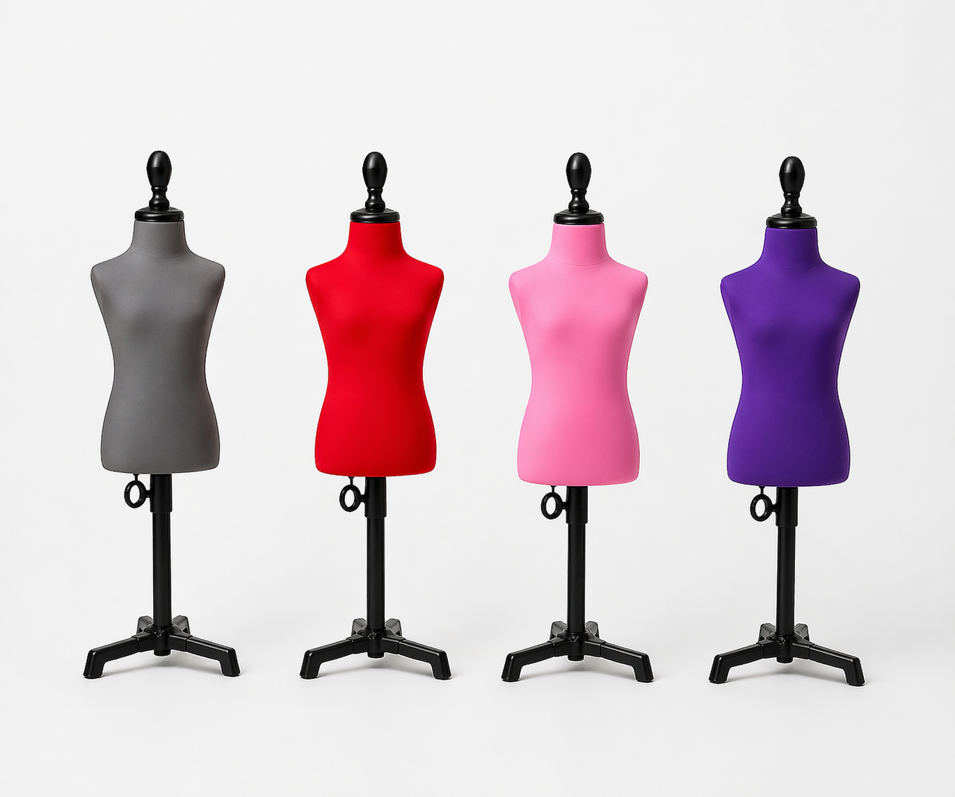 Four kids’ torso dummies in grey, red, pink and purple